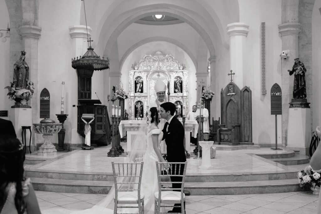 Andrea Jang capturing first kiss at the San Fernando Cathedral