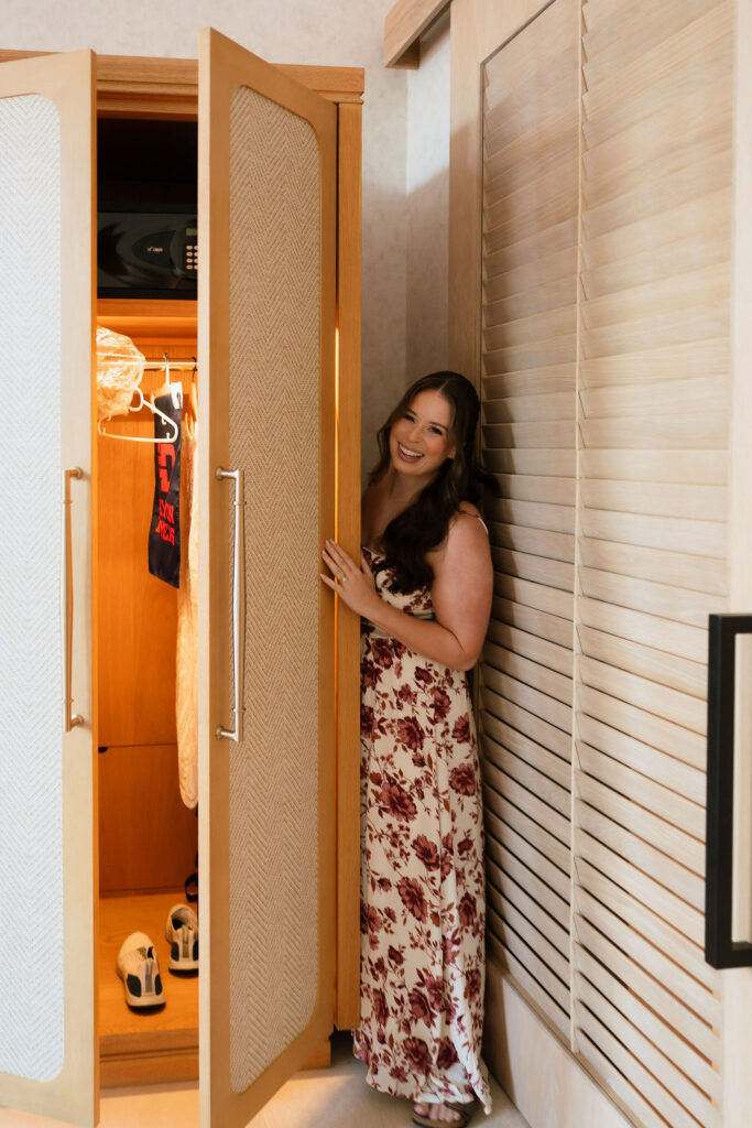Bride getting hair and makeup done in a naturally lit suite at Kimpton Santo San Antonio