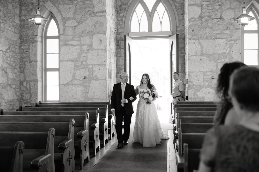 Samantha and Jake during their intimate wedding ceremony at The Little Church of La Villita