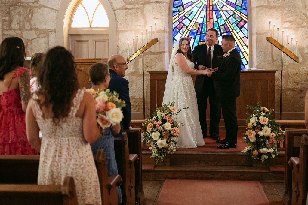 Samantha and Jake during their intimate wedding ceremony at The Little Church of La Villita