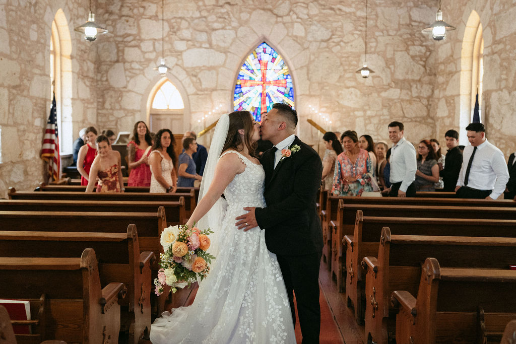 Samantha and Jake during their intimate wedding ceremony at The Little Church of La Villita