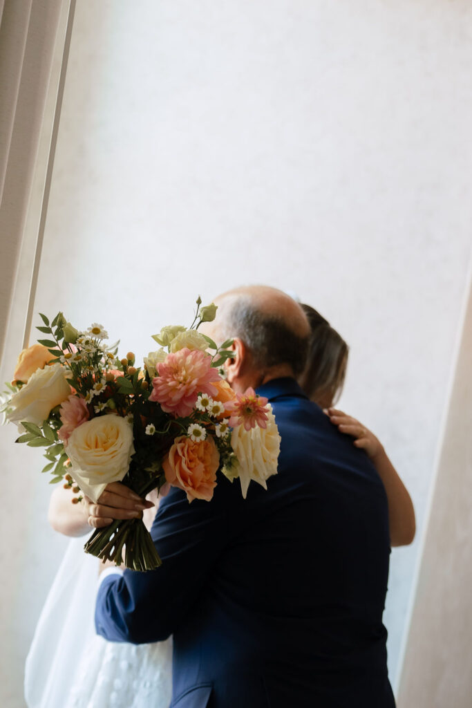 Emotional first look between Samantha and Jake in their San Antonio hotel suite