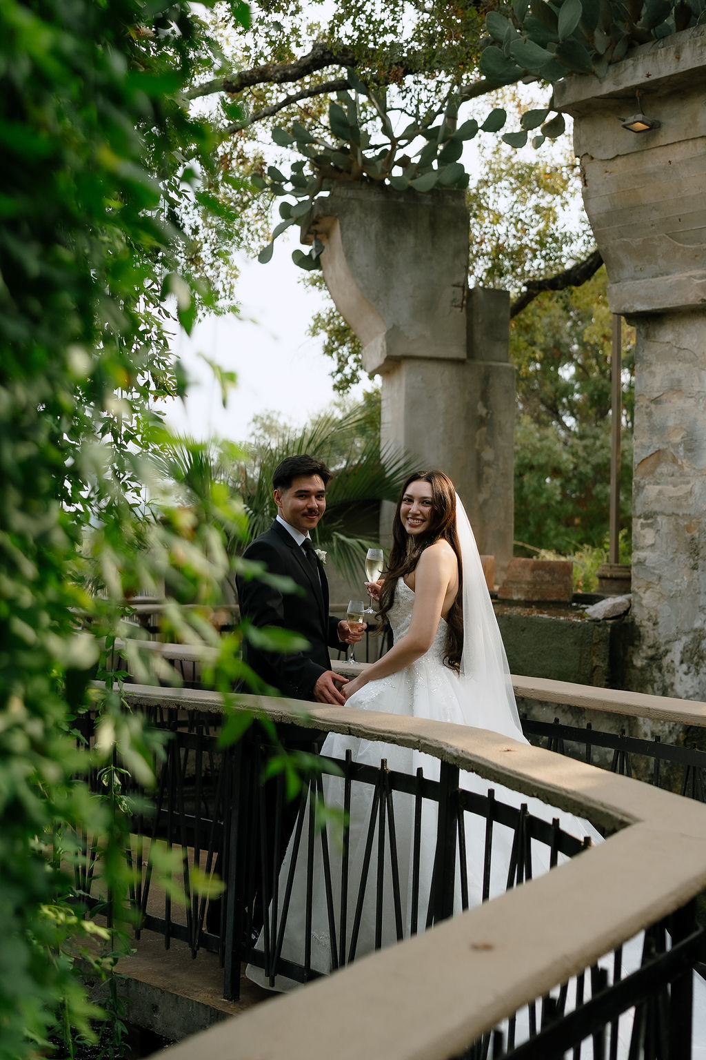 Bride and groom ceremony portrait in golden afternoon light at Villa Antonia Jonestown Texas