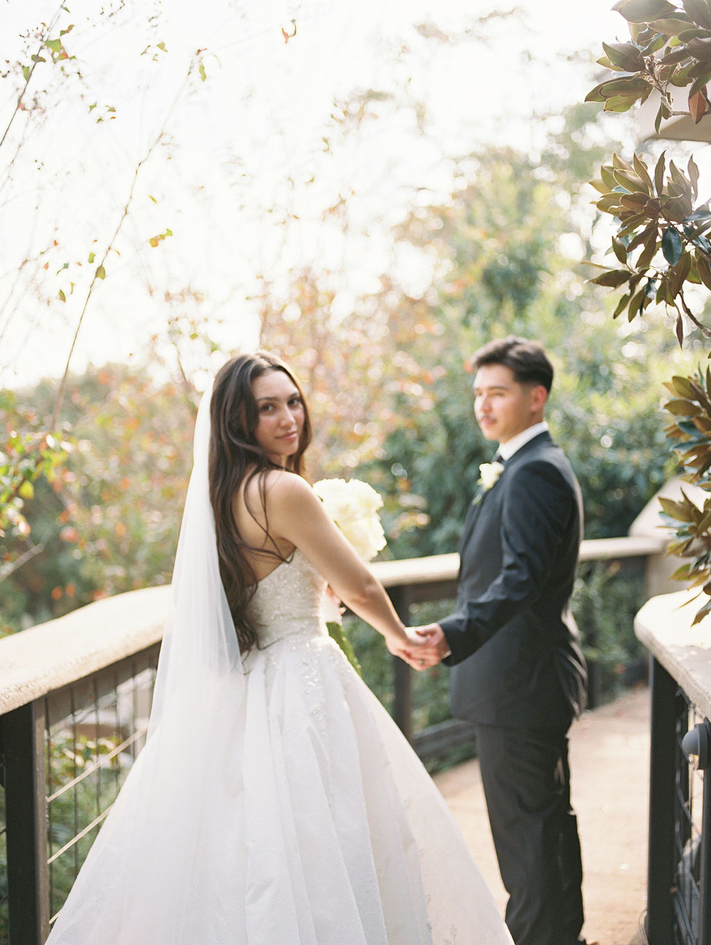 Bride and groom ceremony portrait in golden afternoon light at Villa Antonia Jonestown Texas