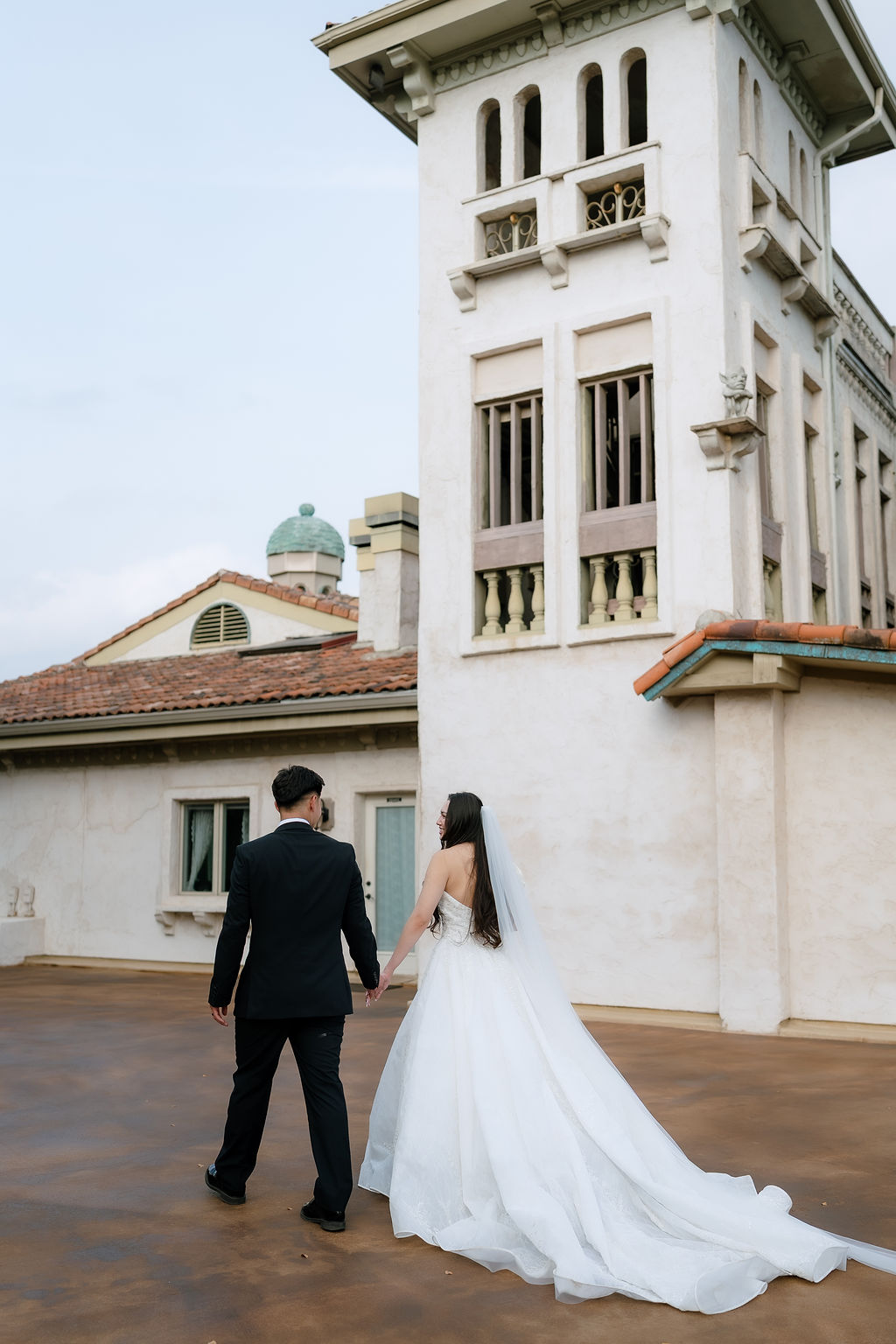 Bride and groom ceremony portrait in golden afternoon light at Villa Antonia Jonestown Texas