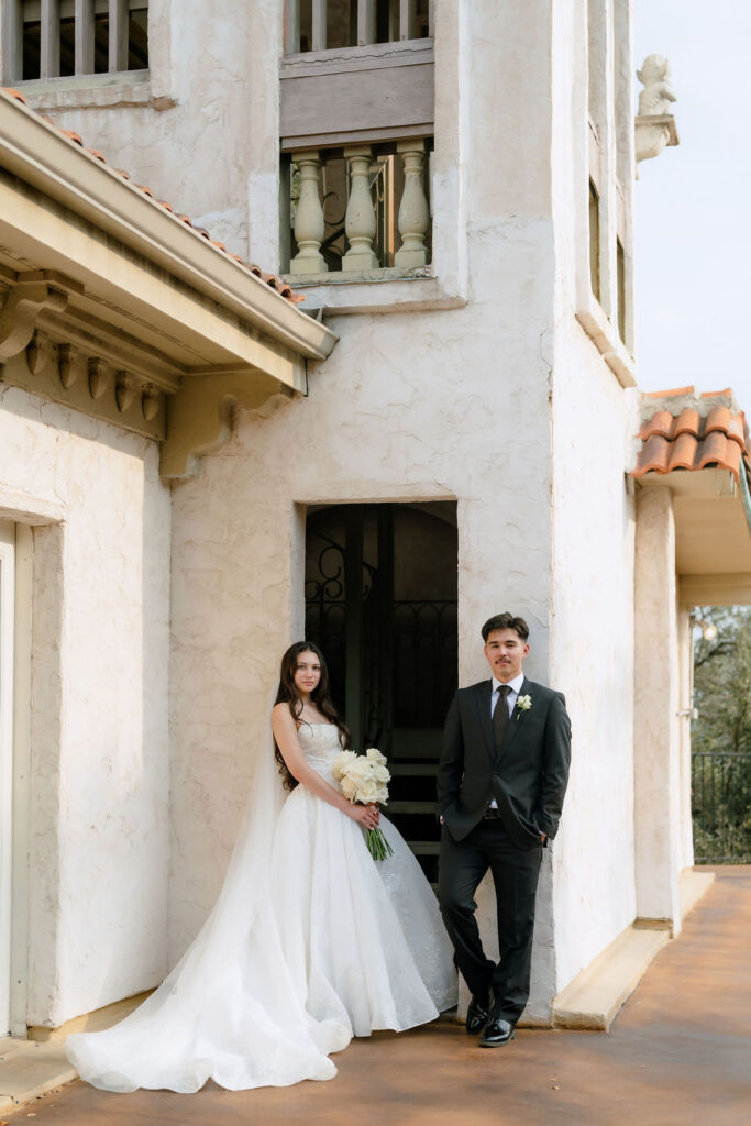 Bride and groom ceremony portrait in golden afternoon light at Villa Antonia Jonestown Texas