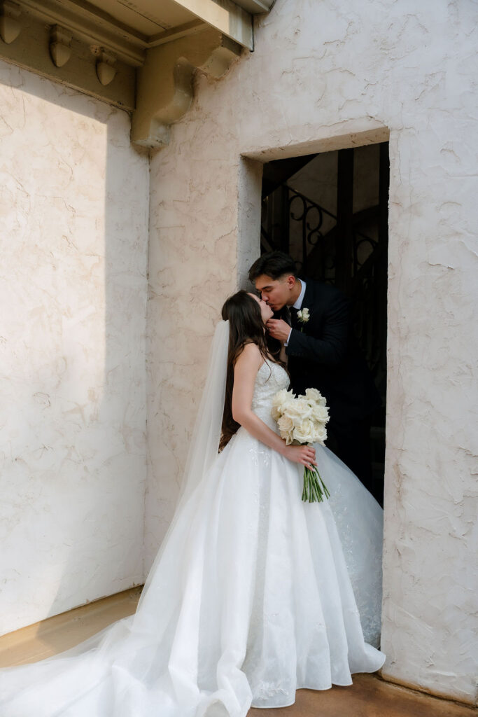 Intimate couple portrait at Villa Antonia wedding venue showcasing timeless black and white wedding theme