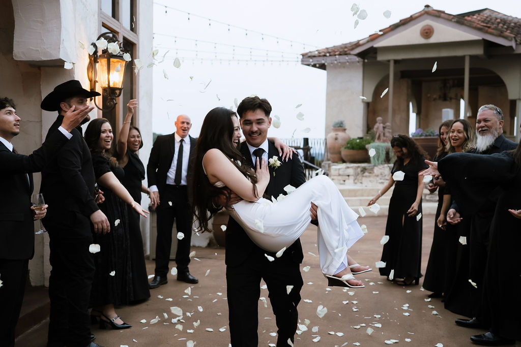 Wedding guests celebrating at Villa Antonia Austin Hill Country wedding venue