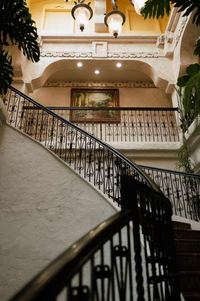 Villa Antonia wedding venue interior with Mediterranean stone arches and Hill Country views in Jonestown Texas