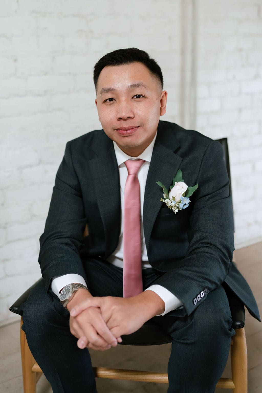 Handsome groom portrait at One Eleven East winter wedding in Hutto Texas, captured by San Antonio wedding photographer Andrea Jang