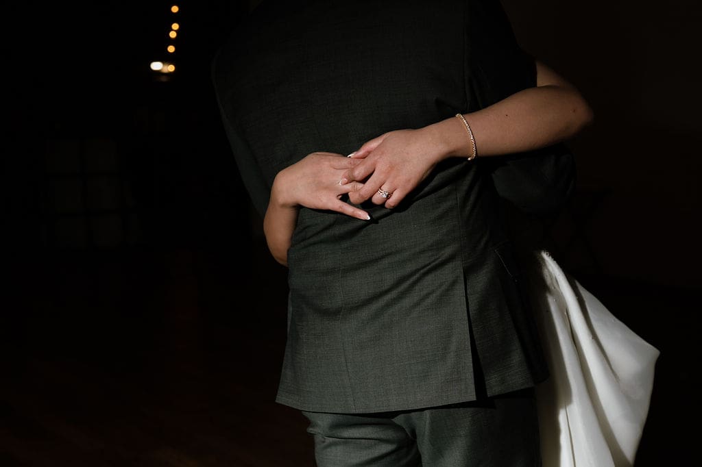Newlyweds dancing alone on the floor at their One Eleven East winter wedding in Hutto Texas, photographed by Andrea Jang Photography