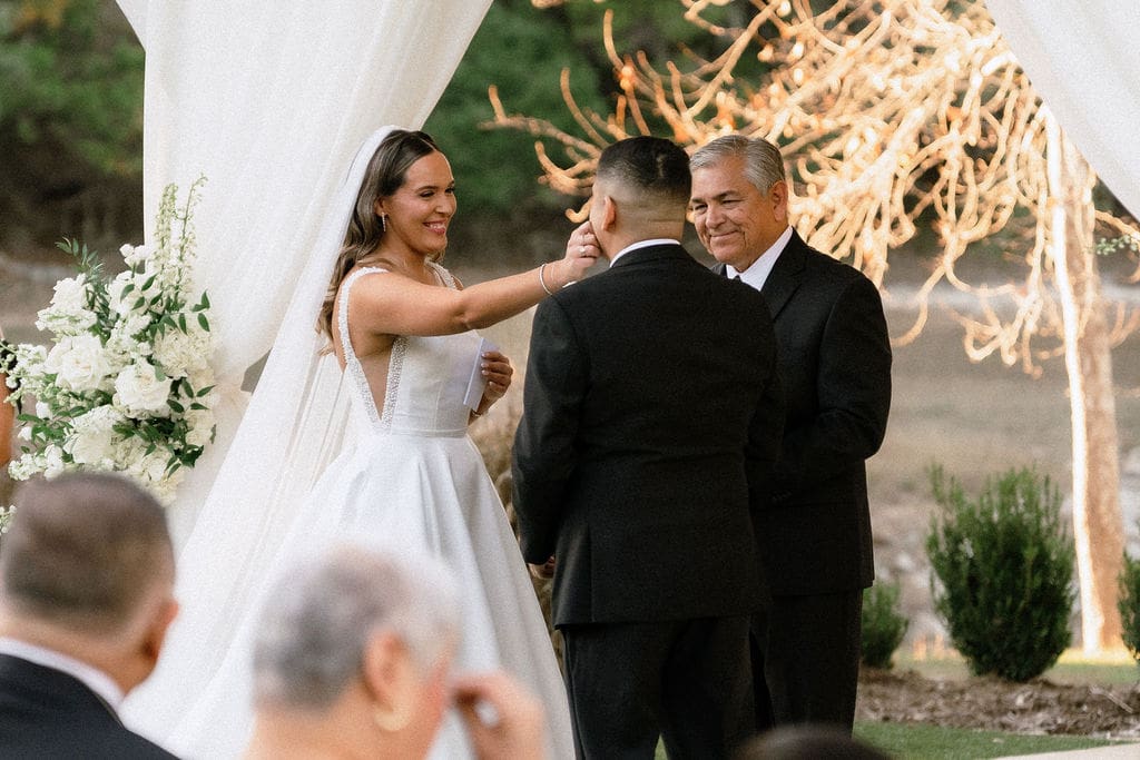 Bride and groom exchanging vows at Kendall Point Boerne Texas