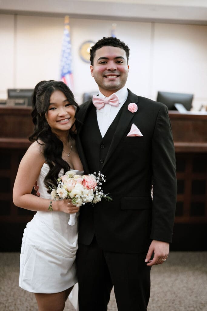 Couple smiling after courthouse wedding ceremony at Judge Helen Petry Stowe Courthouse 1 in San Antonio Texas
