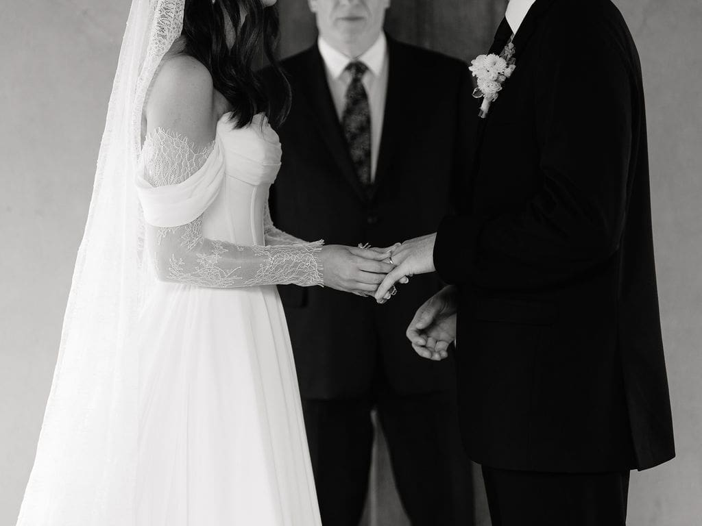 Bride and groom exchanging vows at Chapel Dulcinea in the rain Austin Texas spring wedding