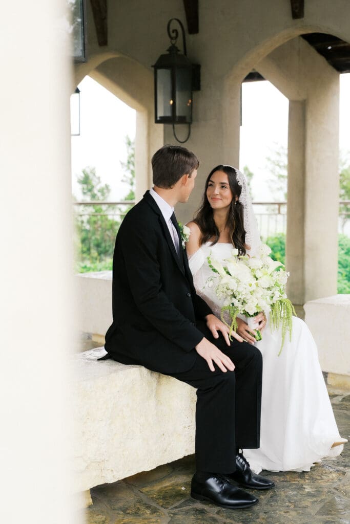 Bride and groom romantic rainy day wedding portraits at Chapel Dulcinea Austin Texas