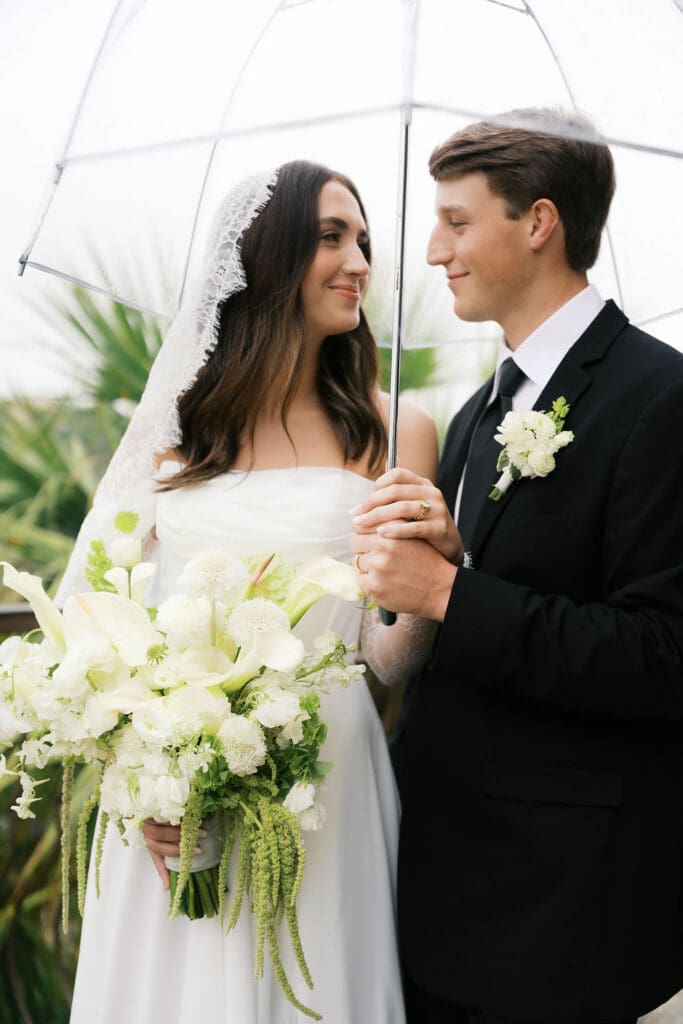 Bride and groom romantic rainy day wedding portraits at Chapel Dulcinea Austin Texas