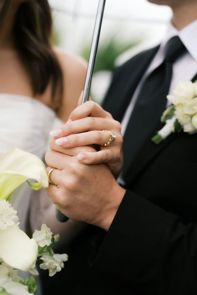 Bride and groom romantic rainy day wedding portraits at Chapel Dulcinea Austin Texas