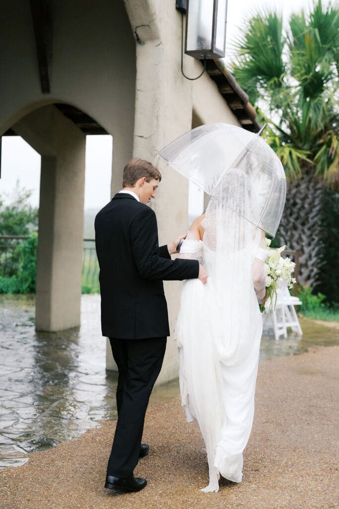 Bride and groom romantic rainy day wedding portraits at Chapel Dulcinea Austin Texas