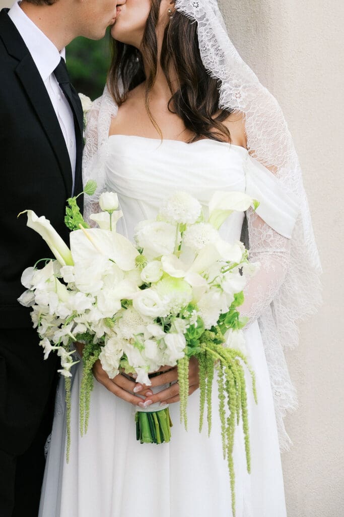 Bride and groom romantic rainy day wedding portraits at Chapel Dulcinea Austin Texas