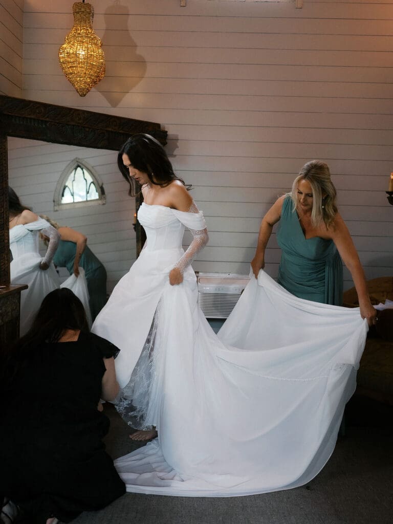 Bride getting ready on a rainy spring wedding morning in Austin Texas