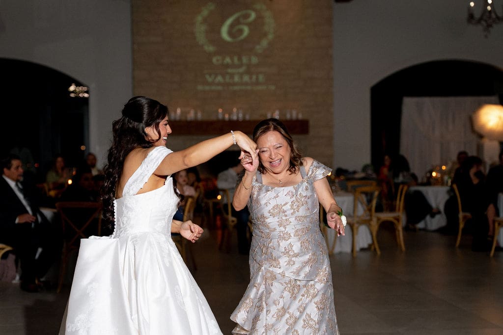 Guests dancing at wedding reception in The Ballroom at The Preserve at Canyon Lake Texas Hill Country