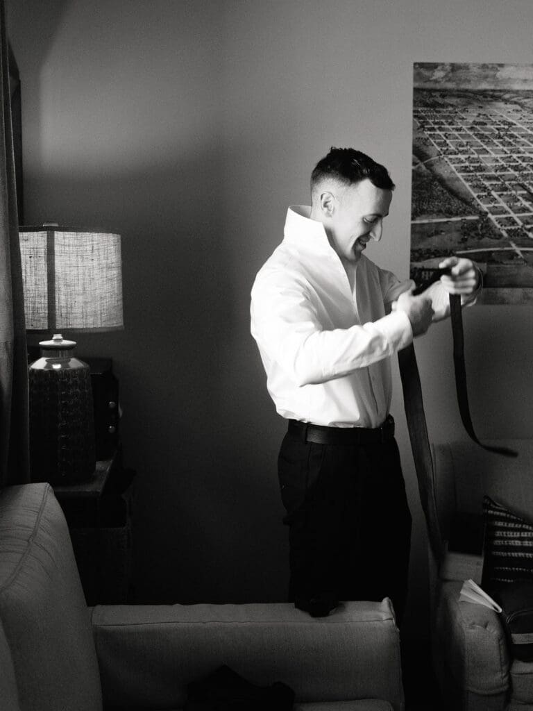 Groom getting ready calmly before his Canyonwood Ridge wedding