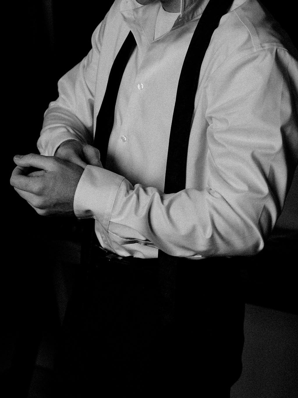 Groom getting ready calmly before his Canyonwood Ridge wedding