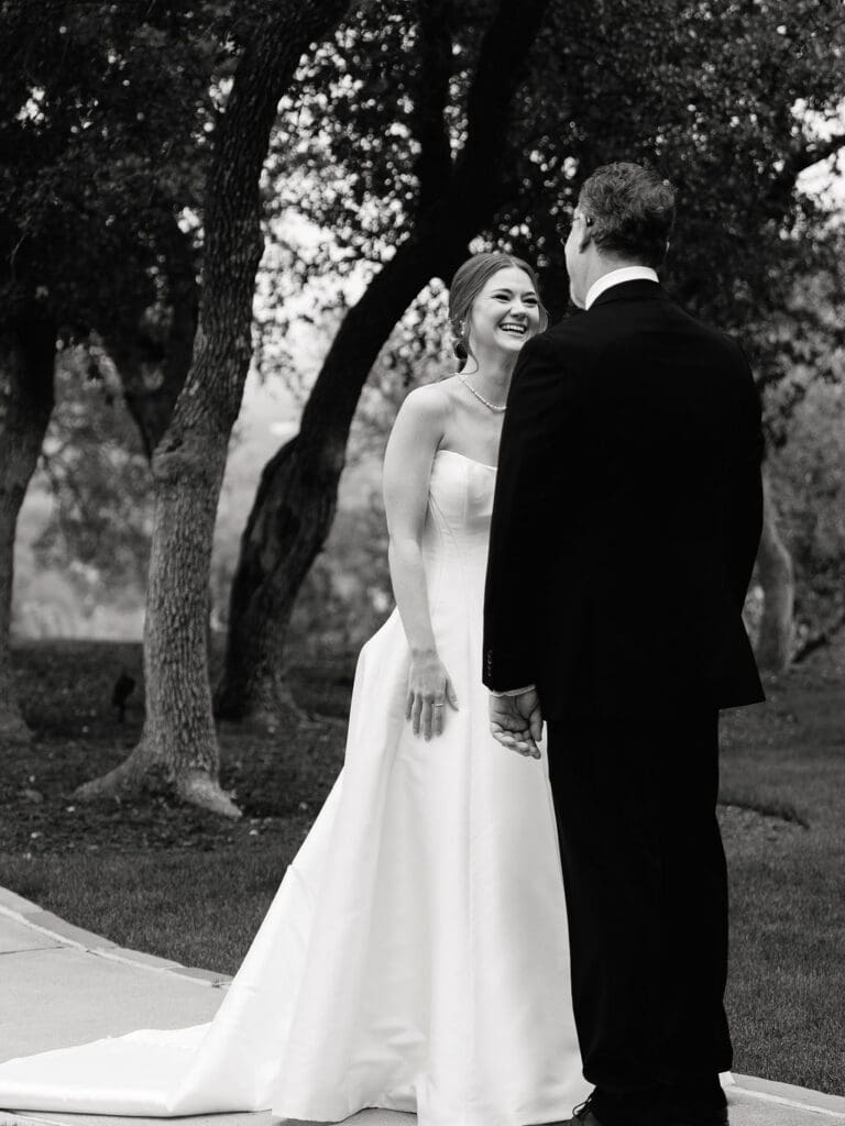 Bride sharing a first look with her father before Canyonwood Ridge wedding ceremony
