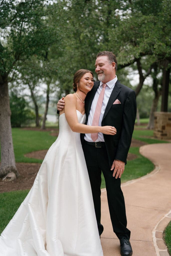 Father reacting emotionally to seeing his daughter in her wedding dress