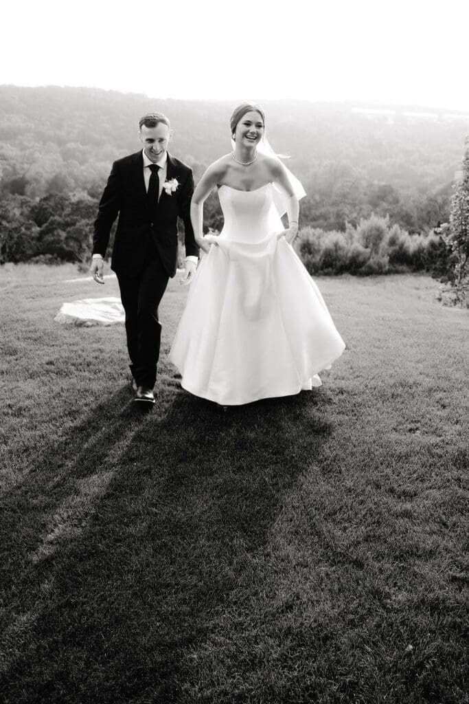 Bride and groom walking through the Texas Hill Country after their Canyonwood Ridge wedding"