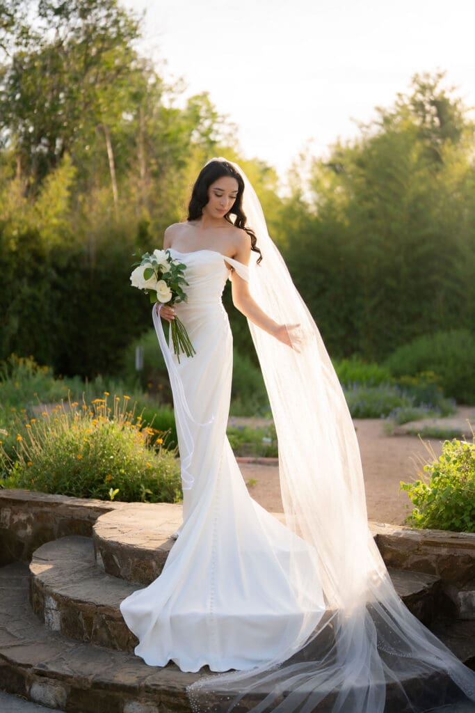 Warm stone walls and lush greenery at Landa Library San Antonio Texas bridal session location