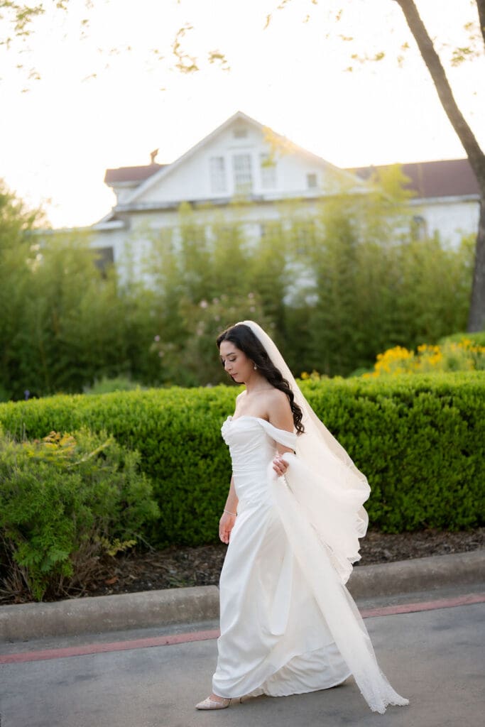 Warm stone walls and lush greenery at Landa Library San Antonio Texas bridal session location