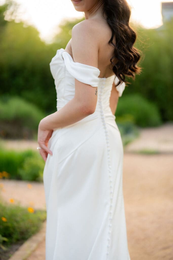 Bride in a white wedding gown standing at Landa Library in San Antonio Texas