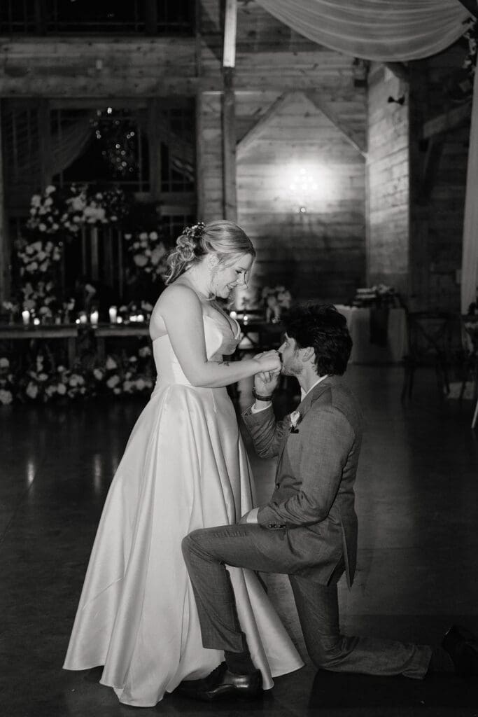 Newlyweds slow dancing at the end of their Addison Grove wedding reception
