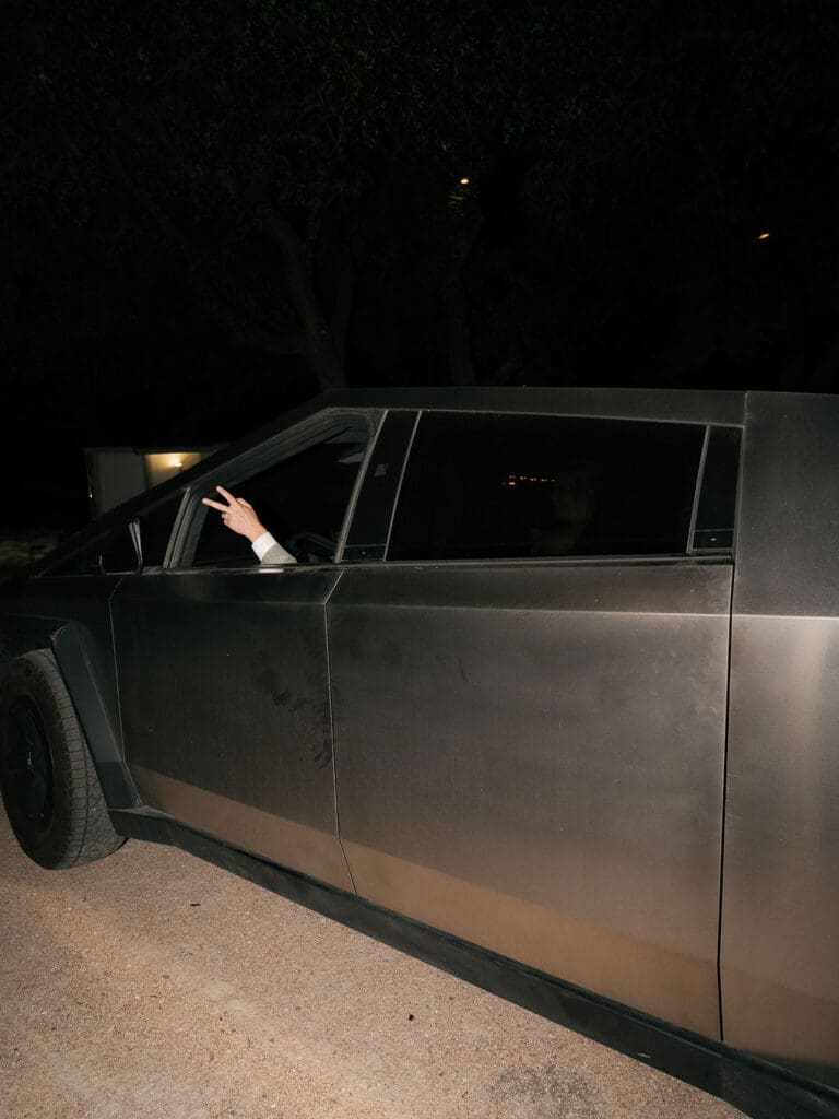 Dana and Jack leaving their wedding in a Cybertruck