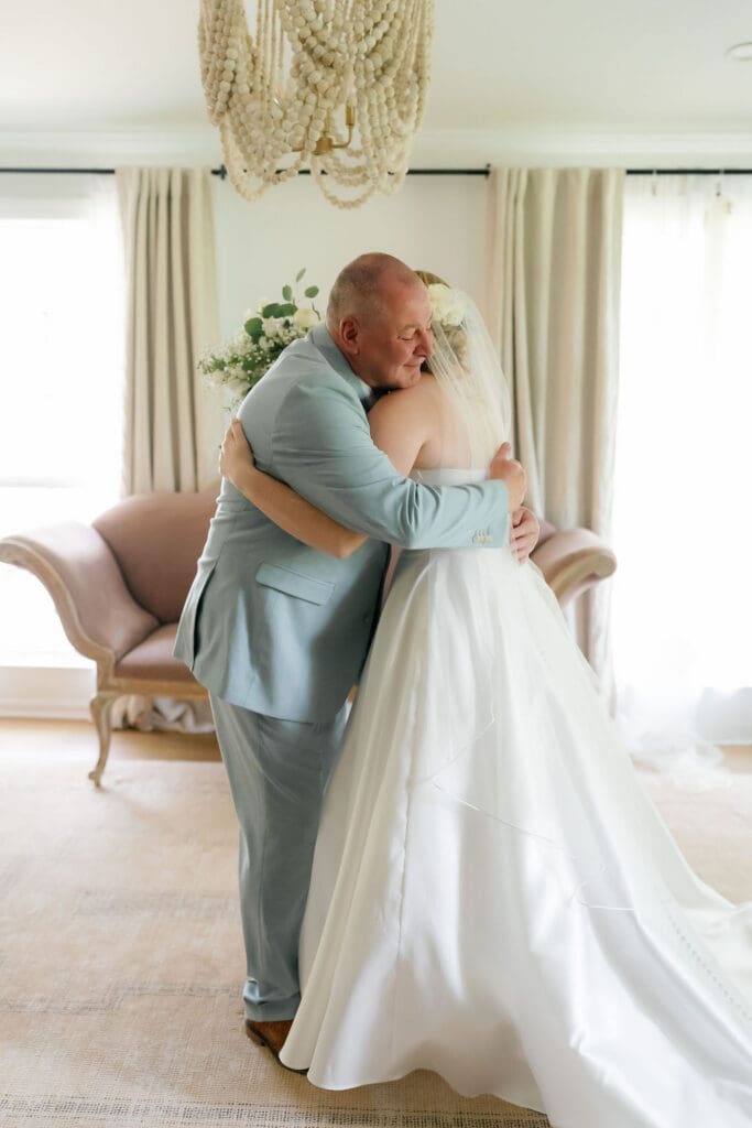 Dana's father seeing her in her gown before their Addison Grove wedding