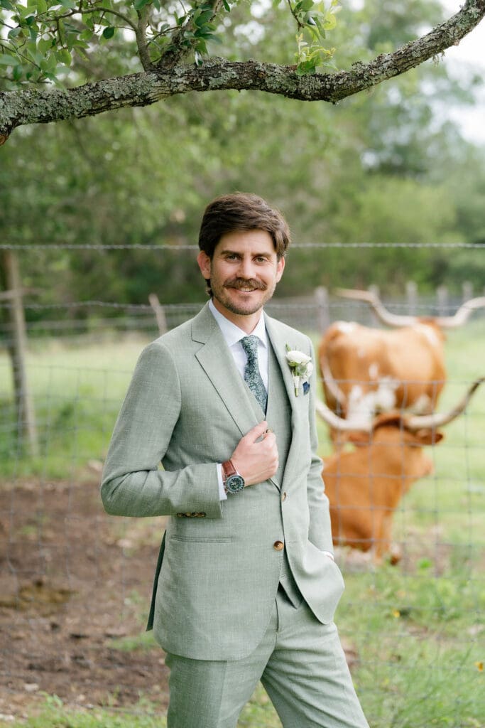 Groom Jack fully dressed in his suit, ready for his Addison Grove wedding
