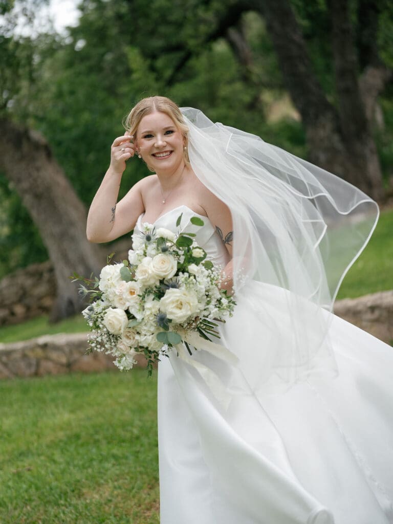 Dana smiling before her Addison Grove wedding ceremony