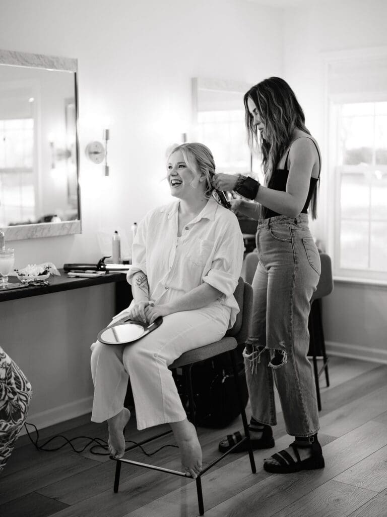 Bride Dana getting ready with her bridesmaids on her wedding morning