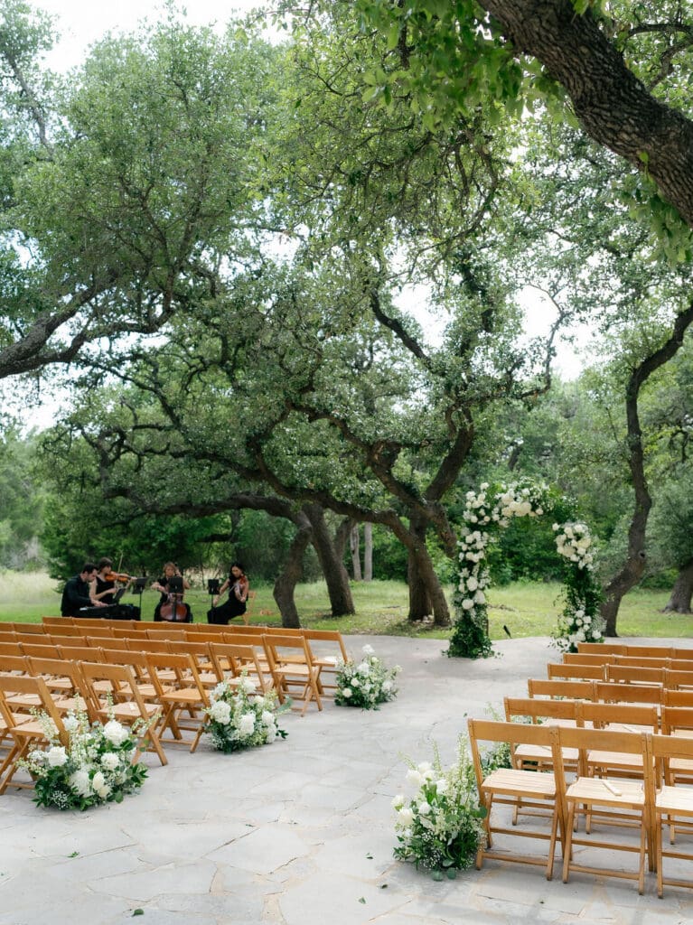 Wedding ceremony setup with natural florals at Addison Grove in Texas