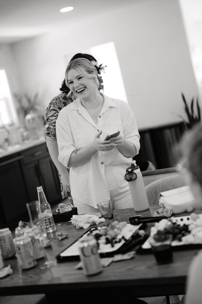 Bride Dana getting ready with her bridesmaids on her wedding morning