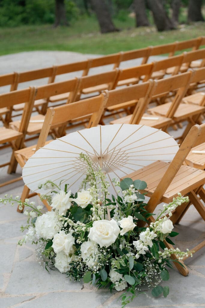 Wedding ceremony setup with natural florals at Addison Grove in Texas