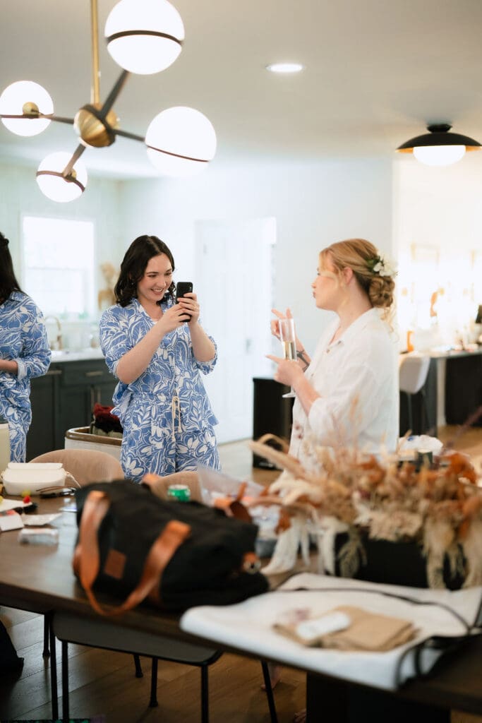 Bride Dana getting ready with her bridesmaids on her wedding morning
