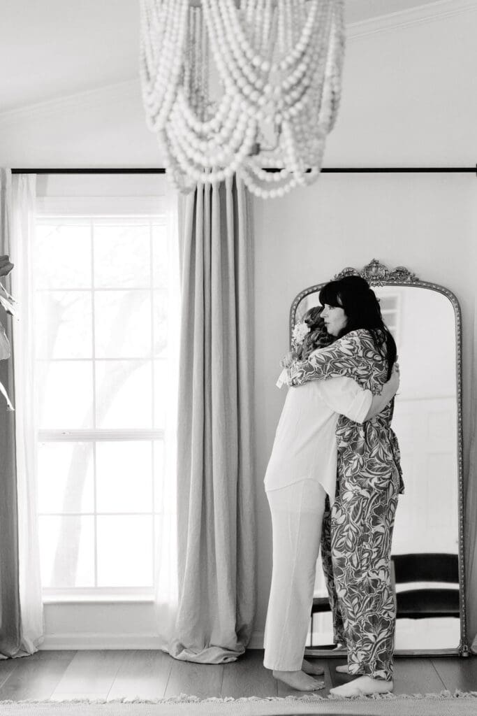 Bride Dana getting ready with her bridesmaids on her wedding morning