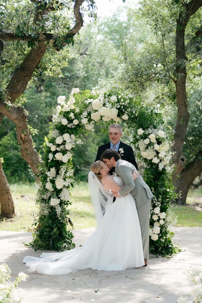 Dana and Jack sharing their first kiss as husband and wife
