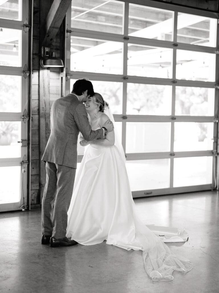 Dana and Jack sharing a quiet moment during couple portraits at Addison Grove