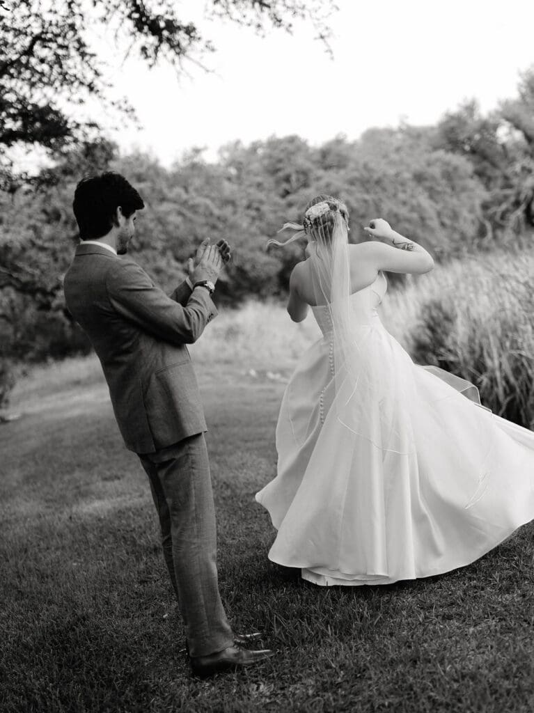 Bride and groom sharing a happy moment at their Addison Grove wedding in Texas
