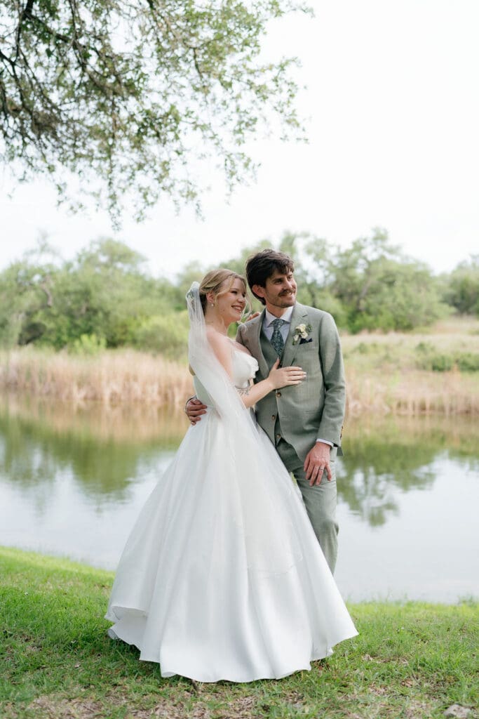 Dana and Jack embracing during romantic couple portraits in Texas