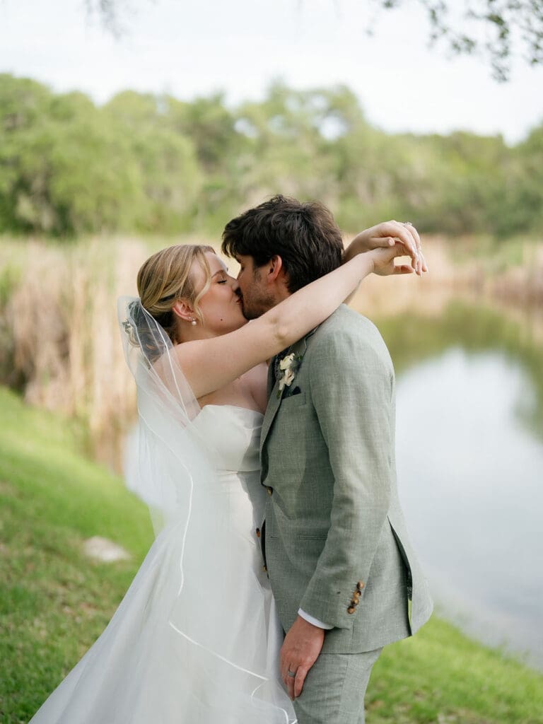 Dana and Jack embracing during romantic couple portraits in Texas