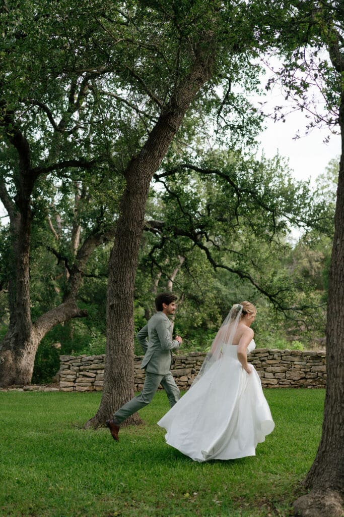 Bride and groom sharing a happy moment at their Addison Grove wedding in Texas